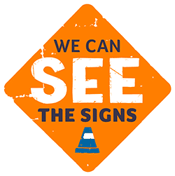 Orange diamond-shaped warning sign reading “We Can See the Signs” with a blue traffic cone icon at the bottom.